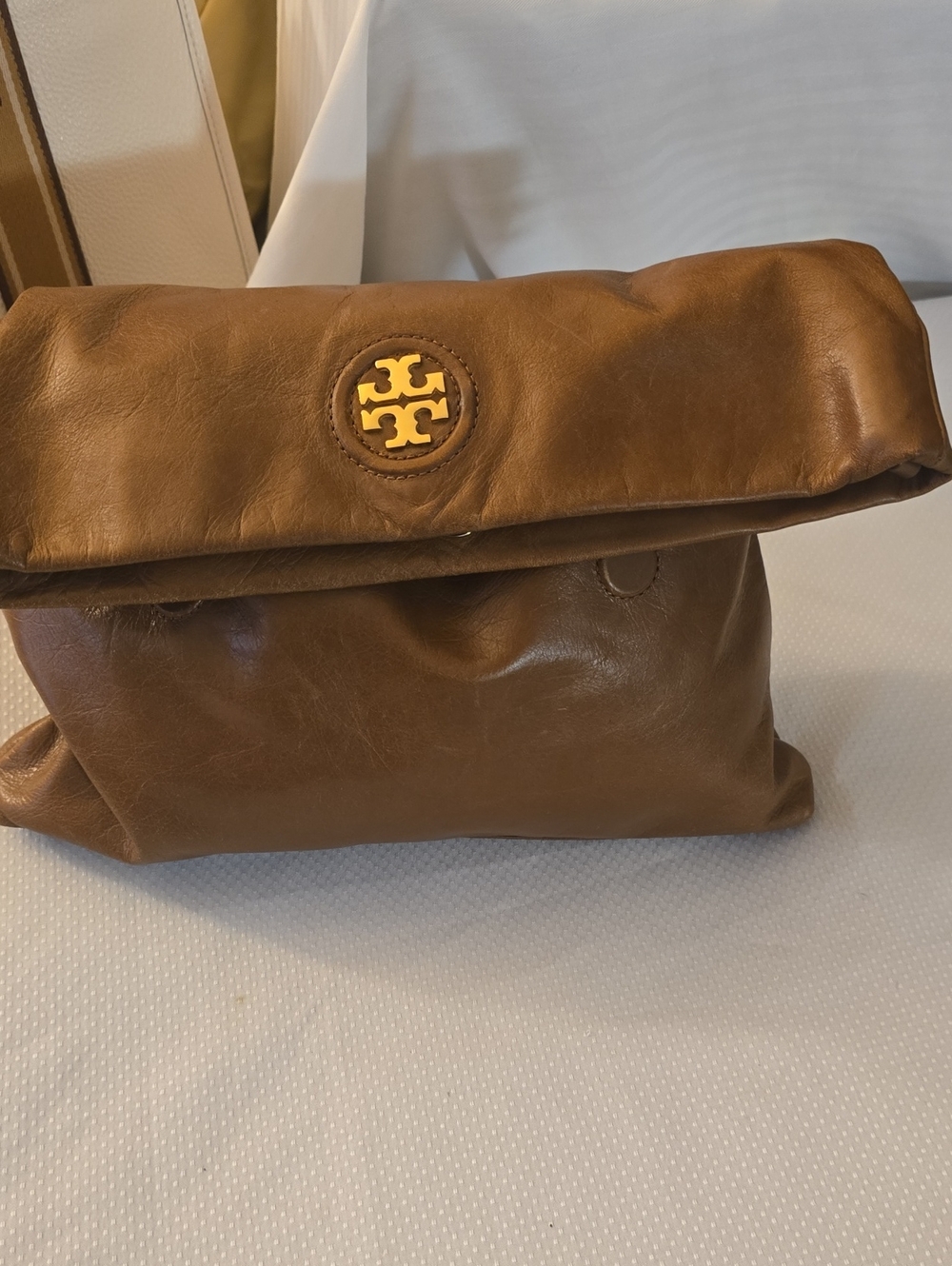 Tory Burch Brown Leather Fold-Top Toiletry Bag with Gold Logo